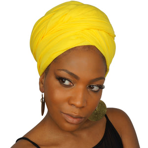 A woman models a bright yellow jersey knit stretch African headwrap, offering a bold and vibrant style with a soft, stretchy fit for comfort and versatility.