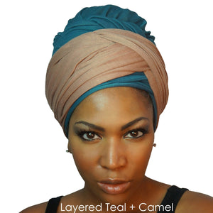 A model showcases a camel tan African headwrap in stretchy jersey knit, blending subtle elegance with a traditional design for everyday style and comfort.